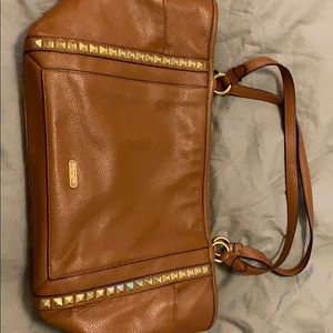 Brown pebble leather studded Coach bag